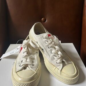 Comme Des Garcons PLAY
x Converse Unisex Chuck Taylor Lace Up Sneakers